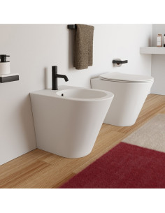 Ceramica Cielo Mare Back to wall sanitary ware rimless toilet, bidet and slim slow-closing toilet seat